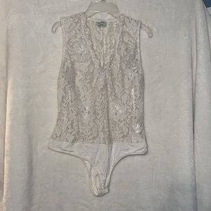 Bebe stretchy cream floral lace bodysuit